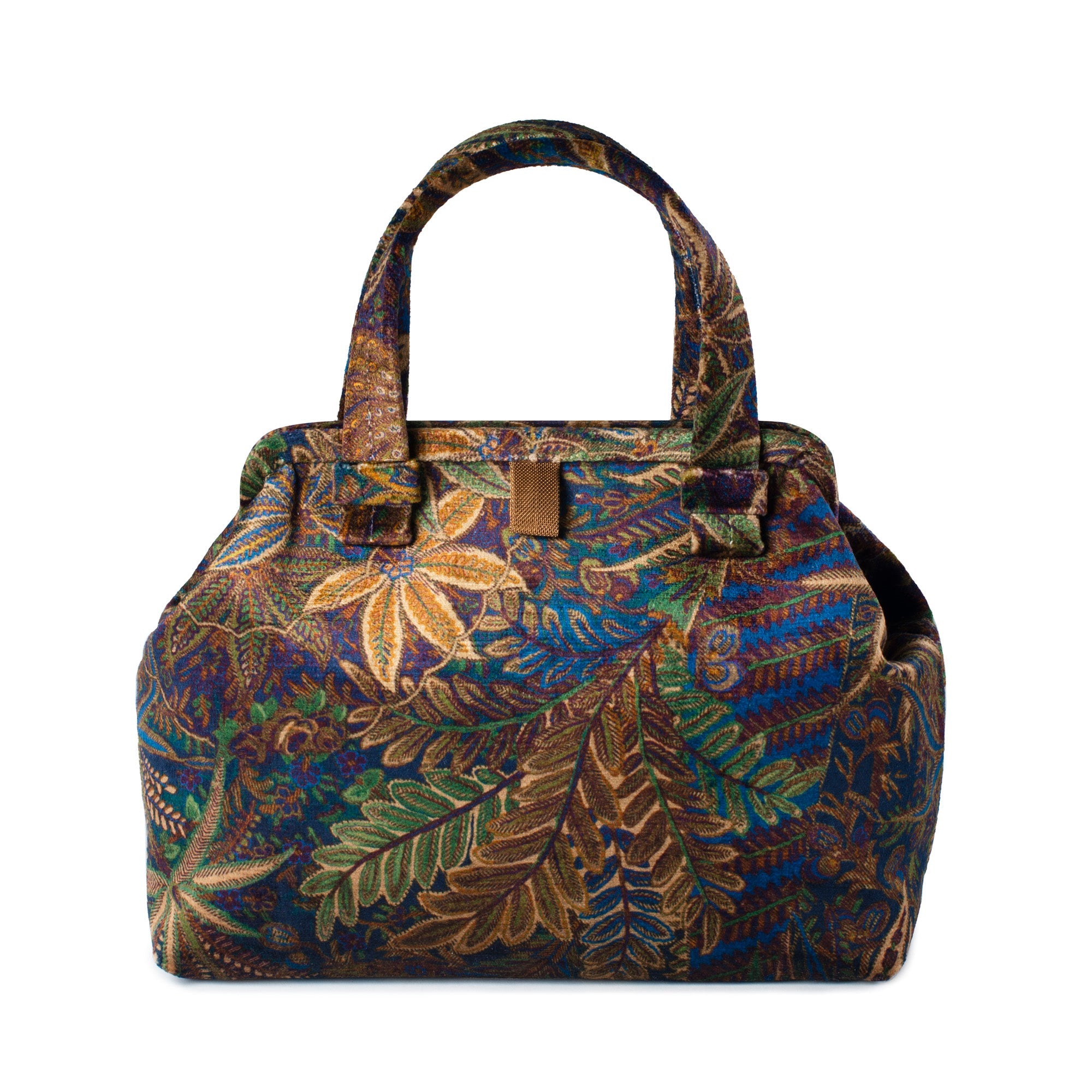 A structured handbag with a dense botanical pattern in shades of blue, green, gold, and brown, featuring dual top handles and a small gold-tone metal accent on the front.